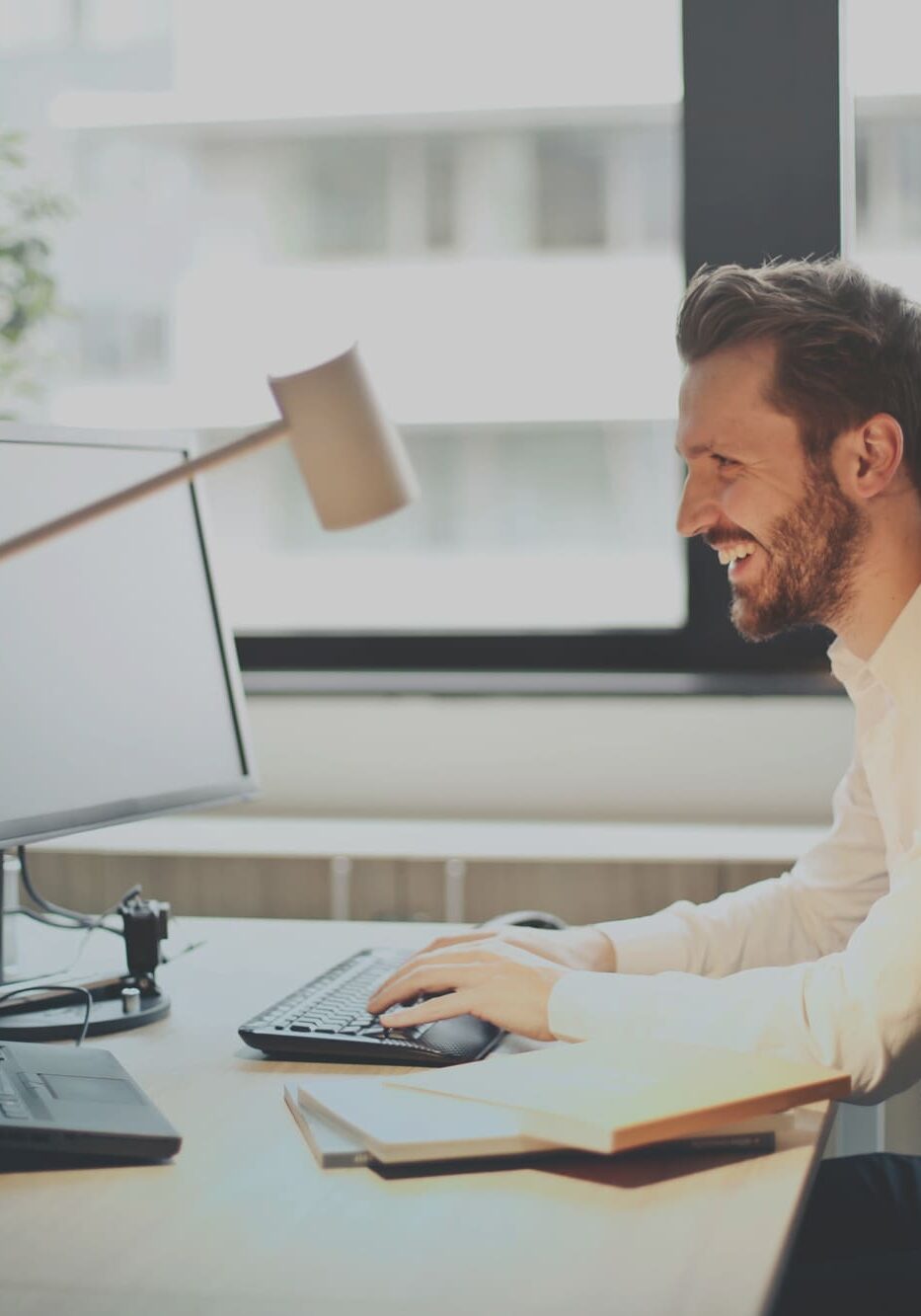 Employee sitting at the desk.